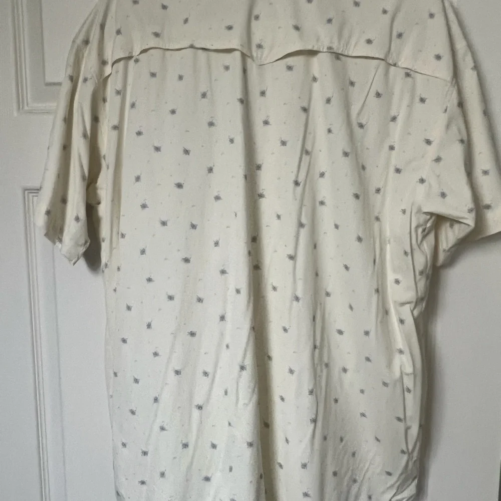 Poncho cream short